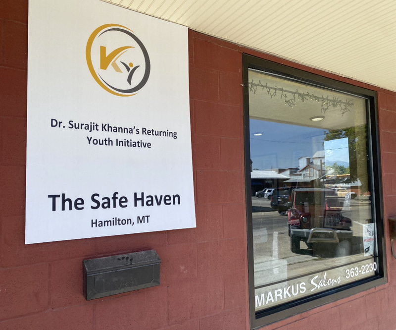 A sign outside the Hamilton, Montana location for Dr. Surajit Khanna's Returning Youth Initiative named "The Safe Haven"