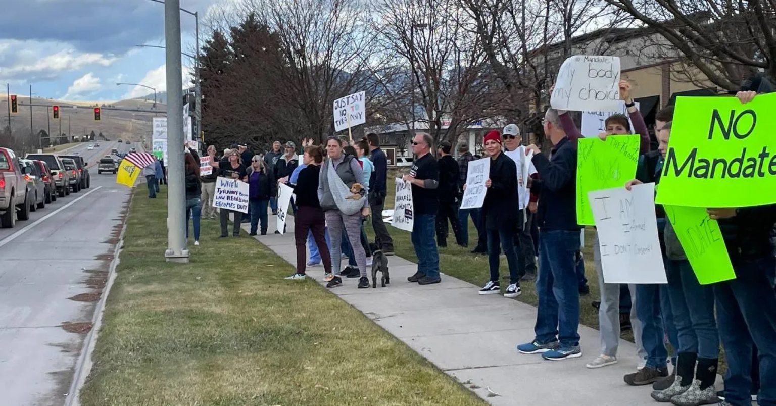 Missoulians lined up in support of healthcare workers at a rally against vaccine mandates on North Reserve Street.