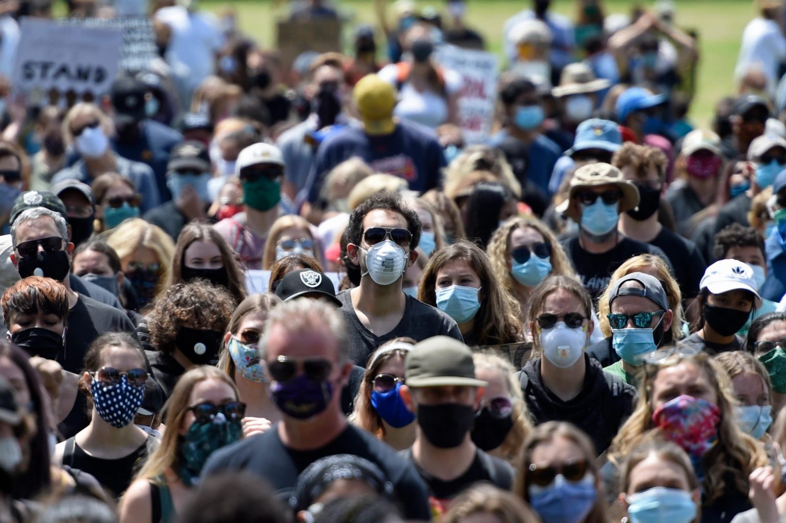 Protesters wear masks while attending a Black Lives Matter protest at Amador Valley Community Park in Pleasanton, Calif., on Friday, June 5, 2020. (Jose Carlos Fajardo/Bay Area News Group)